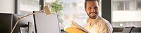 Man with magazine Page Header